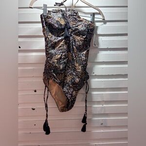 spell and the gypsy
One-Piece Swimsuit